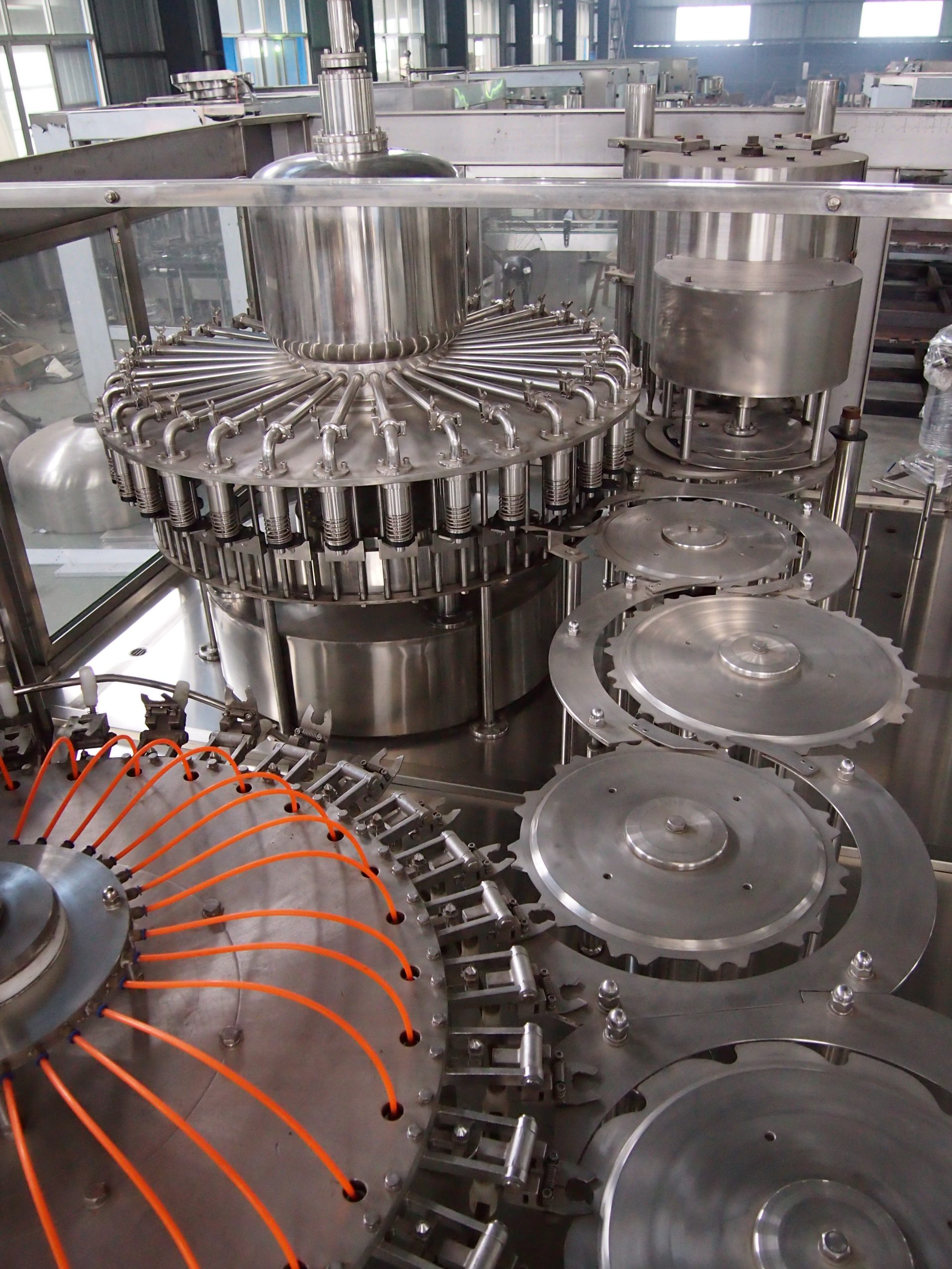 máquina llenadora de jugos con válvula tipo paraguas