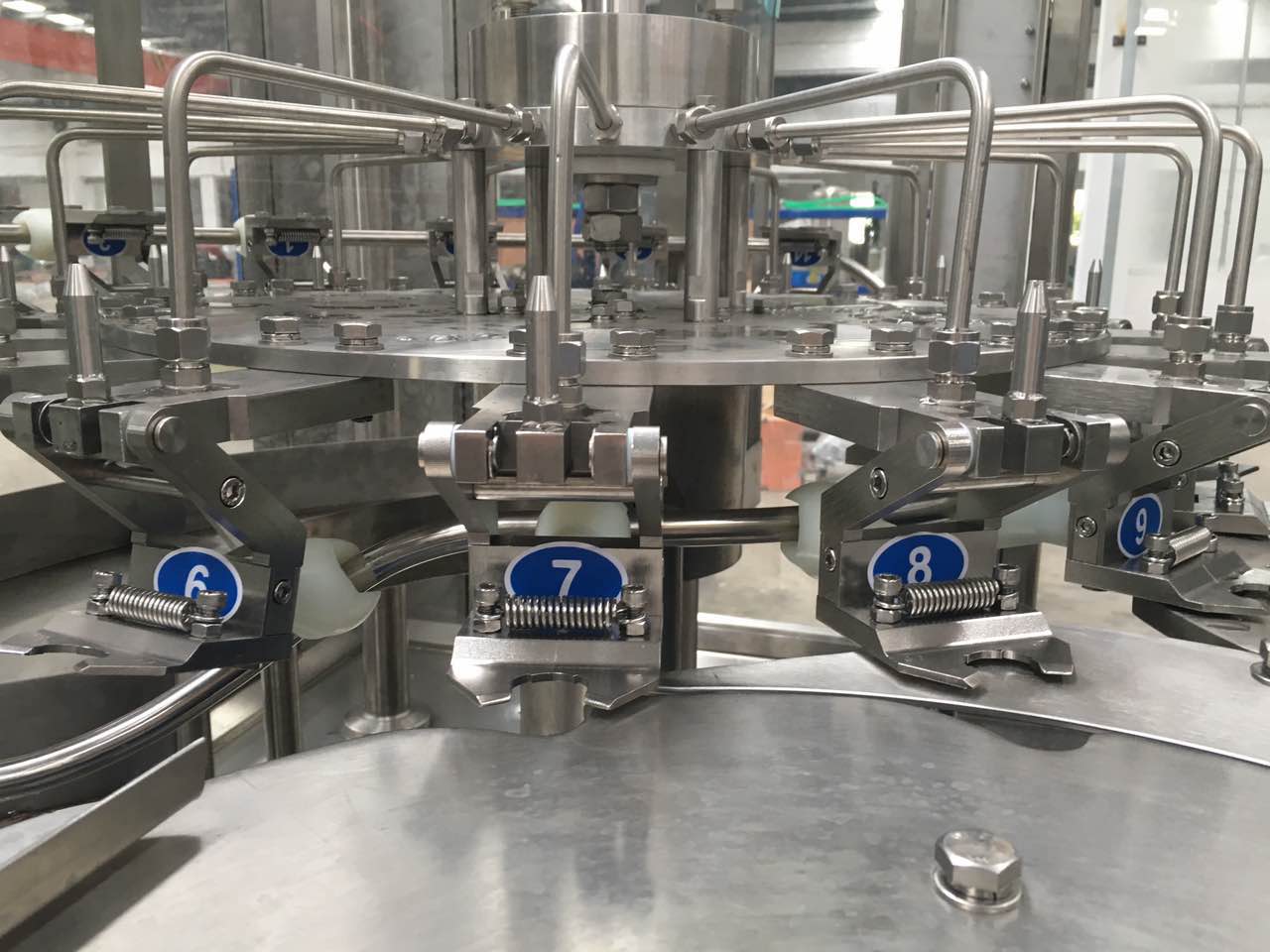 llenadora de agua mineral con clamp por cuello